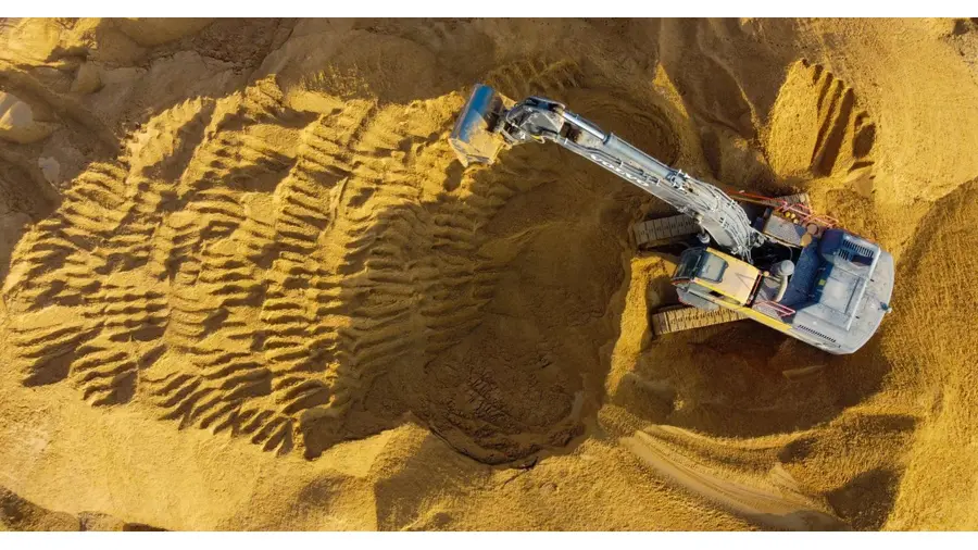 A drone captures an excavator working in a sand pit in Ashdod, Israel.